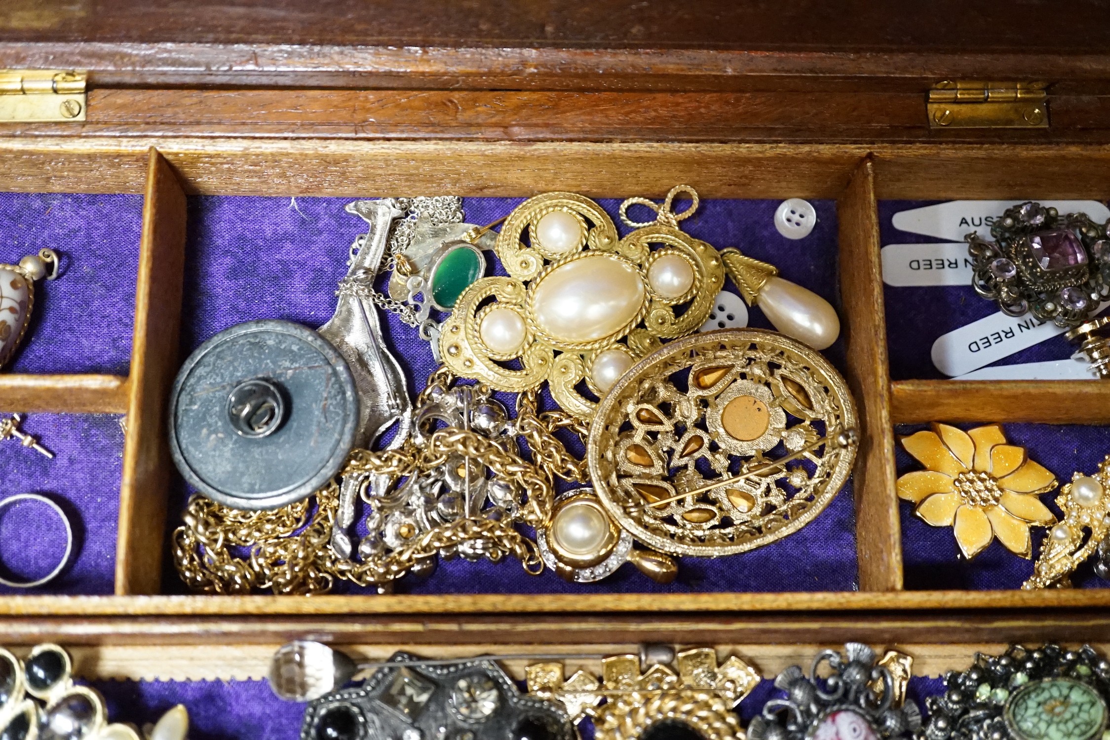 Assorted costume jewellery and wrist watches.